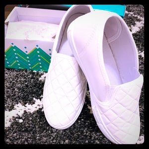Quilted white slip on shoes